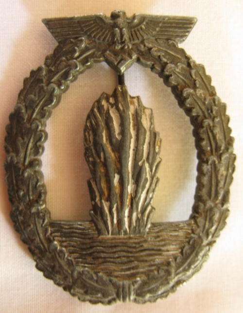 NO. 2965)  GERMAN MINESWEEPER BADGE - ORIGINAL WITH RAISED MAKERS MARK.