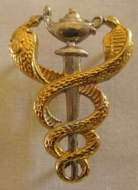 NO. 3906)  S.A. MEDICAL SERVICES BI/M BREAST BADGE WORN BY NURSING OFFICERS 3 PINS.