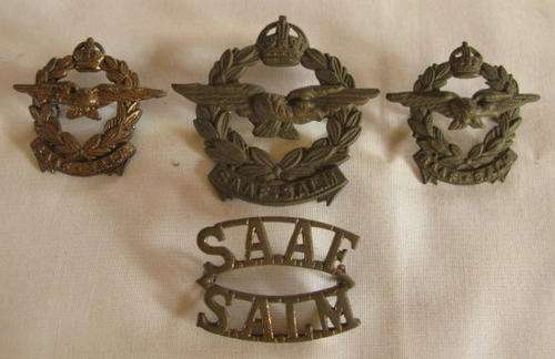 NO. 4452)  SAAF - CAP BADGE + 2 COLLARS + 1 SHOULDER TITLE IN BRASS WORN 1926-1959.  ALL 4 WITH 2