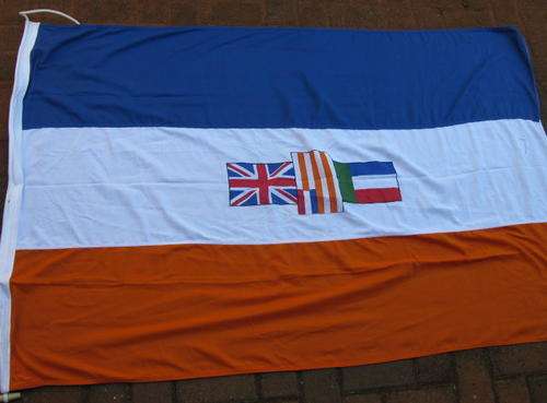 NO. 5477)  OLD CEREMONIAL S.A. FLAG MEASURES 270X180CM.  DATED 1992 - POLYESTER MAKERS MONOGRAMS