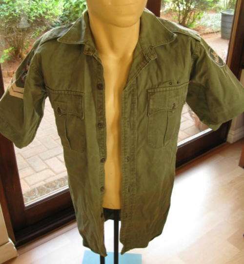 RHODESIA OLIVE GREENS FIELD DRESS SHIRT WITH RHODESIAN ARMY + 2 BRIGADE PATCHES.