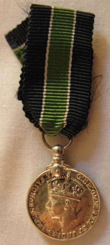 COLONIAL POLICE LONG SERVICE MEDAL - MINIATURE.  GEORGE VI.