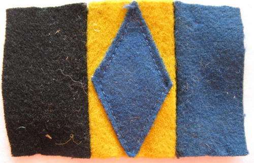 DURBAN LIGHT INFANTRY HELMET FLASH WORN 1923-1942.  ORIGINAL.
