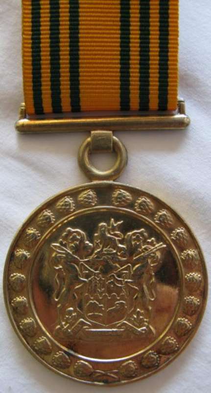 SA PRISONS MEDAL FULL SIZE, SILVER GILT FOR 30 YEARS SERVICE INSTITUTED 1980.