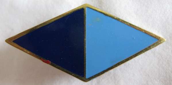 RHODESIAN CORPS OF SIGNALS ENAMEL ON BRASS SLOUCH HAT BADGE WORN ON UPTURNED SIDE OF HAT