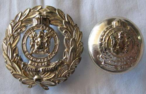 SA RAILWAY POLICE W.O. ARM BADGE NO. 1975 IN OWEN.  LUGS INTACT WITH LARGE BUTTON