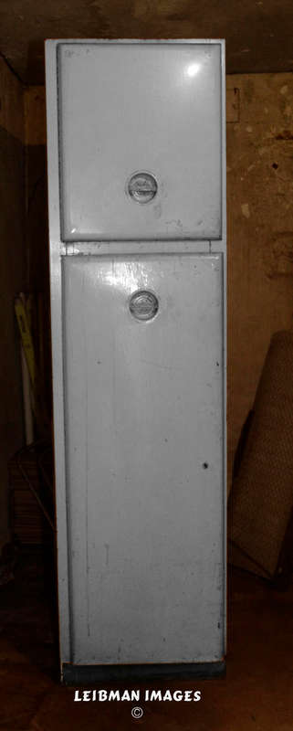 2 DOOR STEEL CUPBOARD IN USABLE BUT SLIGHTLY SOILED CONDITION