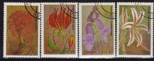 ZAMBIA 1989 CHRISTMAS FLOWERS SET OF 4 V.F.U. SG 604-7. CAT 7,80 POUNDS.