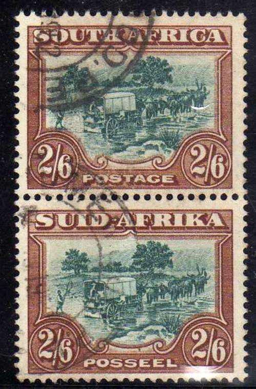 SOUTH AFRICA 1947-54 HYPHENATED & SCREENED PICT 2/6d VERT PAIR VFU. SACC 120. CAT R350. (SACC 2015).