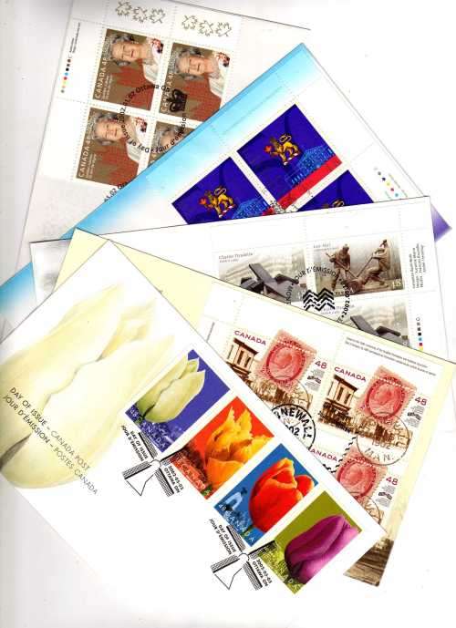CANADA 2002.  5 FDC's VERY FINE. SG 2115, 2128, 2134-37, 2153-54 & 2155. CAT 11,20 POUNDS.