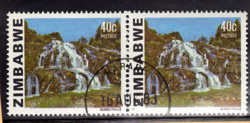 ZIMBABWE 1983 DEFIN 40c BUNDI FALLS PAIR VFU. SG 588a. CAT 8 POUNDS.
