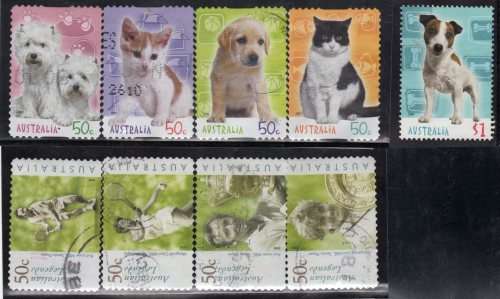 AUSTRALIA 2 VERY FINE USED SETS (1) 2003 TENNIS PLAYERS SET OF 4. (2) 2004 CATS AND DOGS SET OF 5.
