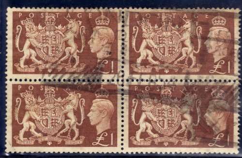 GREAT BRITAIN 1951 1 POUND BROWN BLOCK OF 4 FINE USED PARCEL CANCEL. SG 512. CAT 72 POUNDS.