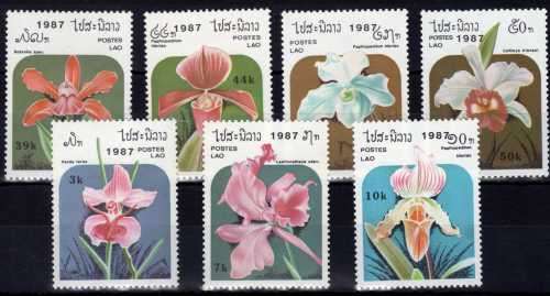 LAOS 1987 ORCHIDS SET OF 7 & MINI SHEET LMM. SG 1004-1011. CAT 7 POUNDS.