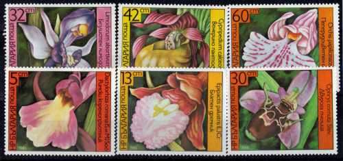 ORCHIDS 2 SETS BELGIUM 1985 SET OF 3 & BULGARIA 1986 SET OF 6. CAT 6,45 POUNDS.