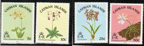 CAYMAN ISLANDS 1985 ORCHIDS SET OF 4 VERY LMM. SG 605-608. CAT 8,25 POUNDS.
