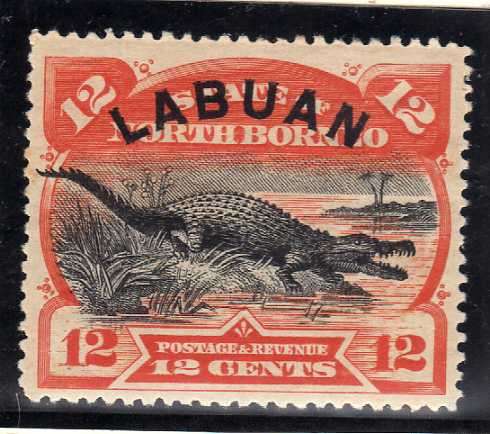 NORTH BORNEO / LABUAN 1894 DEFIN 12c ORANGE-VERMILLION PERF 14,5 x 15 LMM. SG 70. CAT 23 POUNDS.