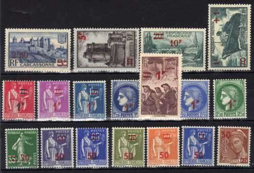 FRANCE 1940 SURCHARGED STAMPS x 18 L.M.M. SG 672-688, 707. CAT 9 POUNDS.