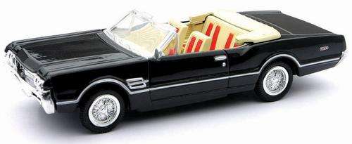 1966 Oldsmobile die cast model.