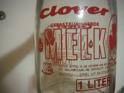 Vintage glass CLOVER milk bottle