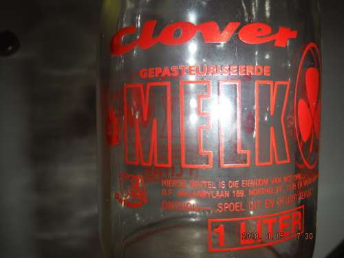 Vintage glass CLOVER milk bottle