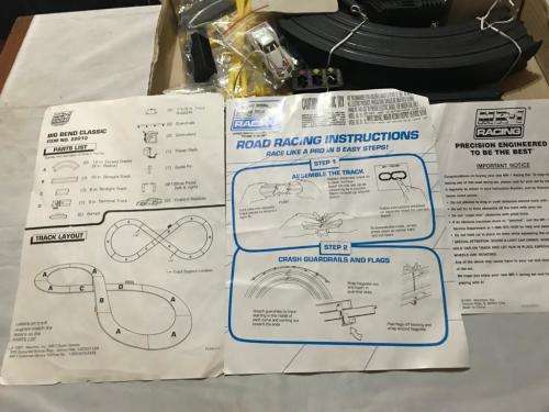 Slot car set with 4 cars. Not tested