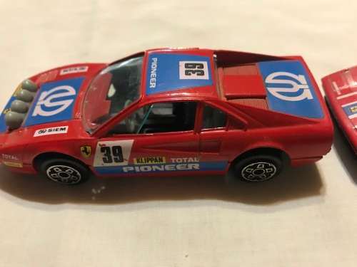 2 X FERRARI, BURAGO, 1:43 scale. Made in Italy. CARS