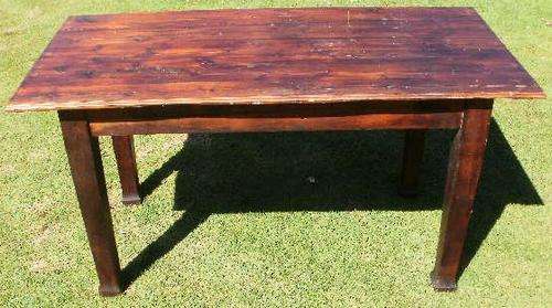 A STAINED OREGAN AND OAK TABLE