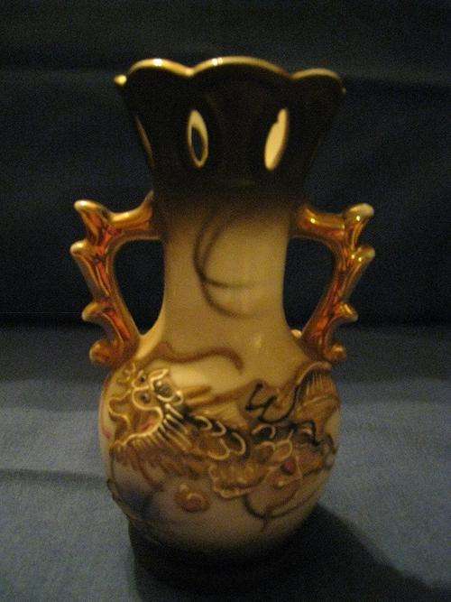 Old perfume bottle and Detailed dragon vase