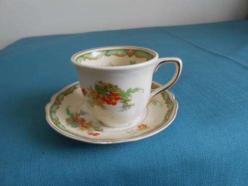 Demi-tasse cup and saucer