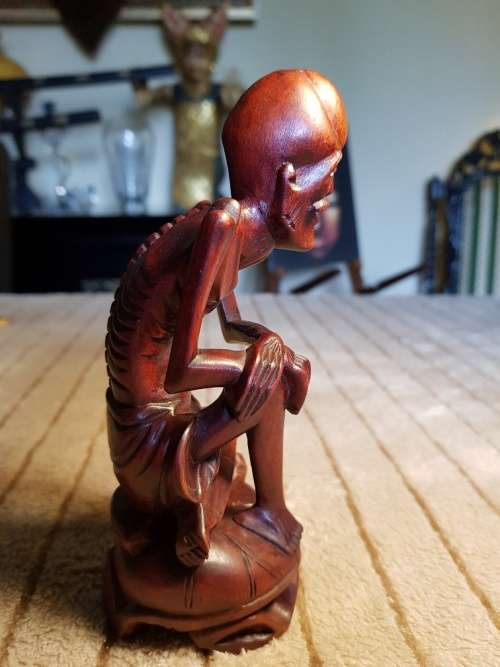 Antique wood carved netsuke figurine