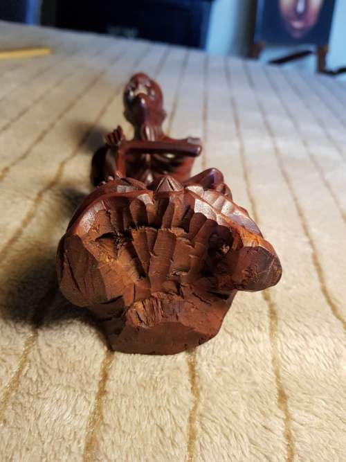 Antique wood carved netsuke figurine
