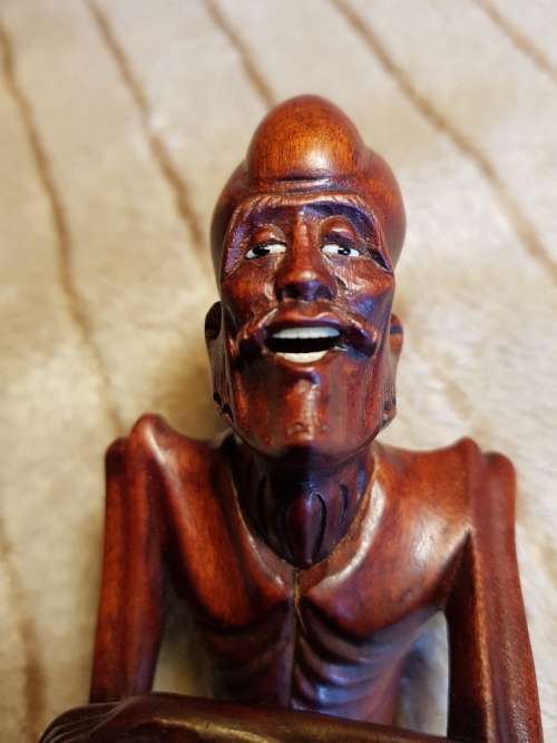 Antique wood carved netsuke figurine