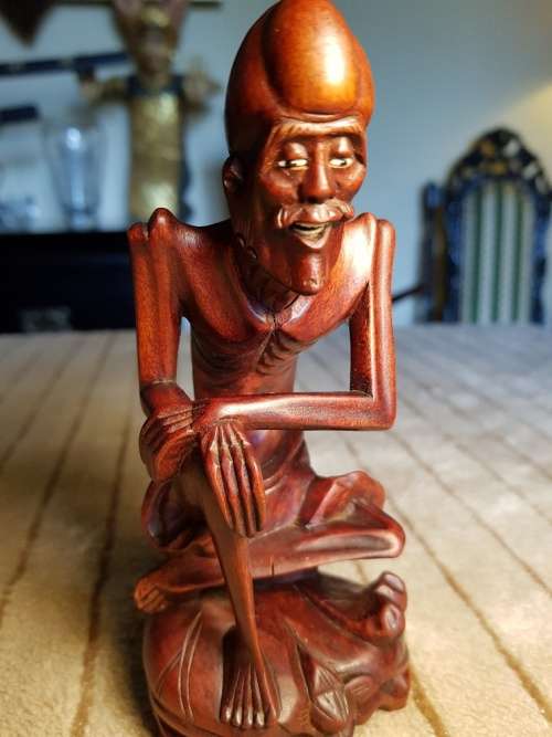 Antique wood carved netsuke figurine