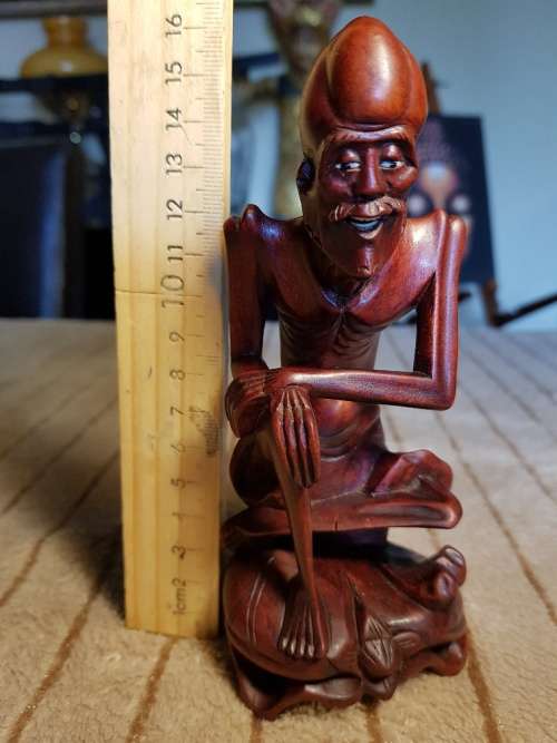 Antique wood carved netsuke figurine
