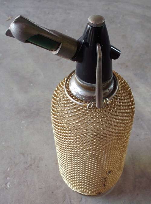 Seltzer Soda Bottle with golden mesh