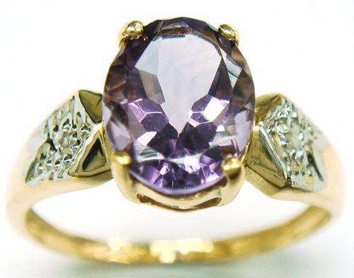 FINE 9KT YELLOW GOLD OVAL 2.3CT AMETHYST & DIAMOND RING