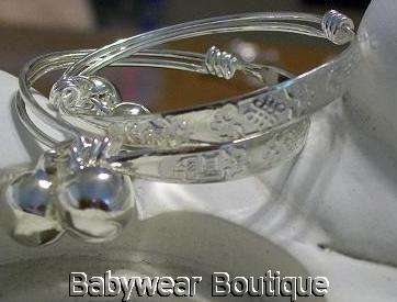 ENGRAVED PATTERNED BABY BRACELET WITH BALL RATTLE