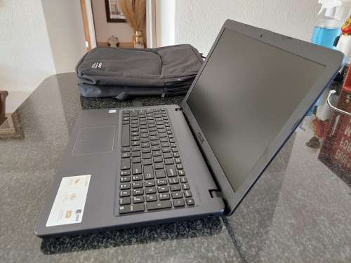 Almost New Asus I3 Laptop and bag