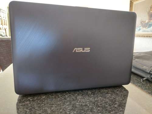 Almost New Asus I3 Laptop and bag