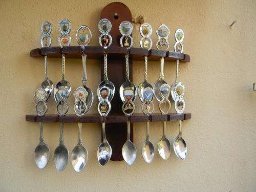 "WOW" Stunning collector spoon from S.A. Towns and overseas. In good condition.With rack