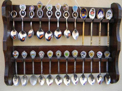 "WOW" 24 Stunning collector spoon from all around the world. In good condition.With rack