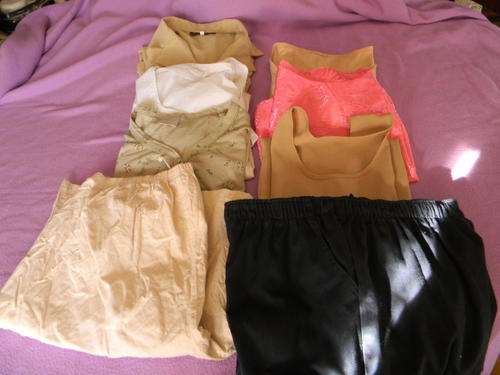 A bulk of women clothing.8 Pieces. See pictures. Size 16 (40). In good condition.