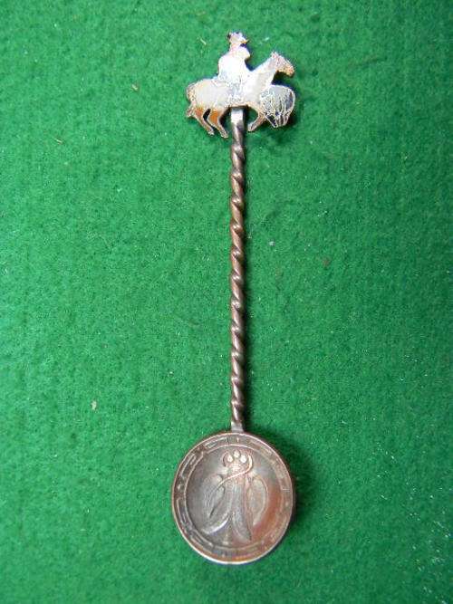 Souvenir spoon with an Cowboy on an horse (have haul mark and markedGhile)