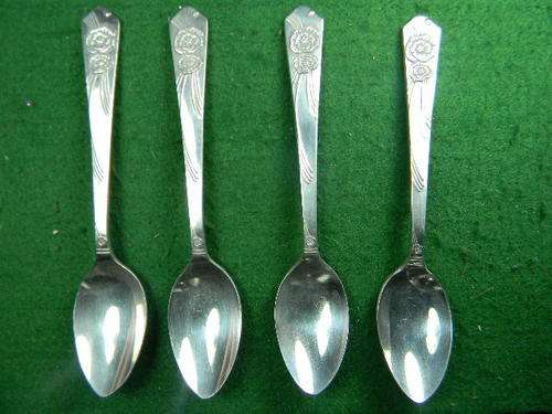 4 Souvenir spoon with an rose (have mark  lilac epns a1 made in sheffield England Bid per spoon.