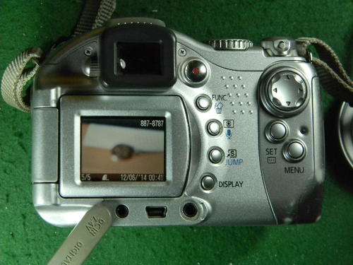 Canon Power shot S1 Is Complete with  new 8 GB memory card cables and manual (100% working order)