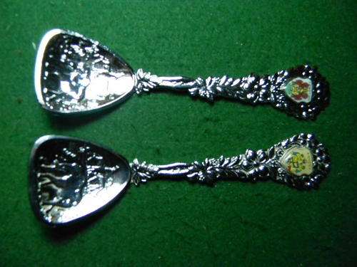 2 Sugar spoons with elephants in the spoons