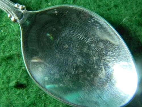 CH Dien silver plated spoon has marks in spoon