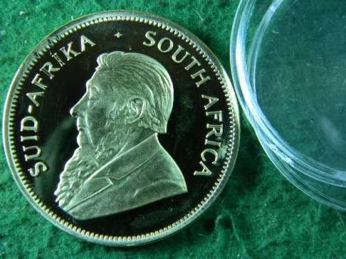 Fake Kruger rand 1978 1 oz Fine gold coin gold plated not solid gold in plastic holder