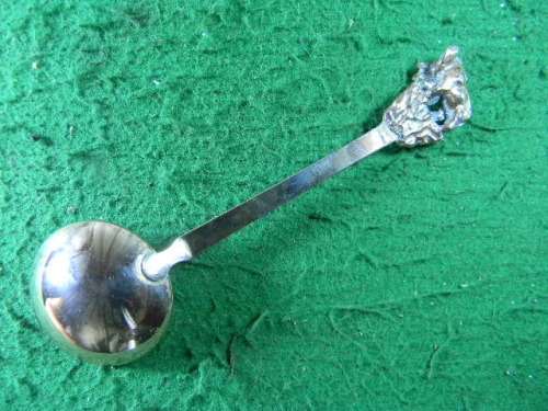 Elefant  spoon  yellow copper in good condition  as per pictures